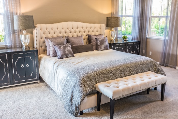 Upholstered bed frame in a bedroom